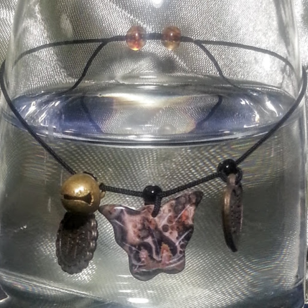11" bracelet w/butterfly & chinese symbols NWT